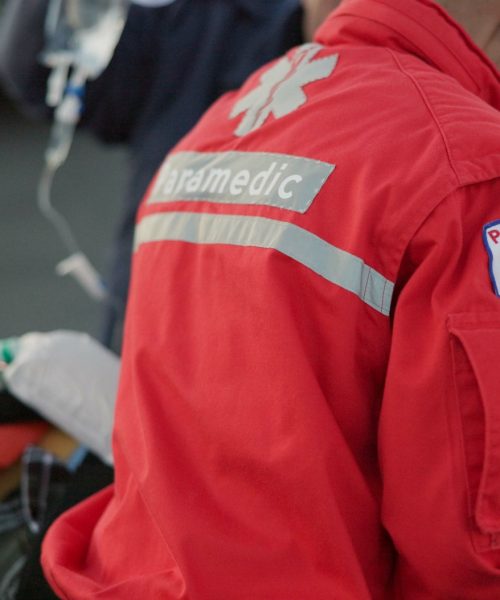 People, paramedic and help patient in outdoor on scene for emergency, rescue and support. Emt team,